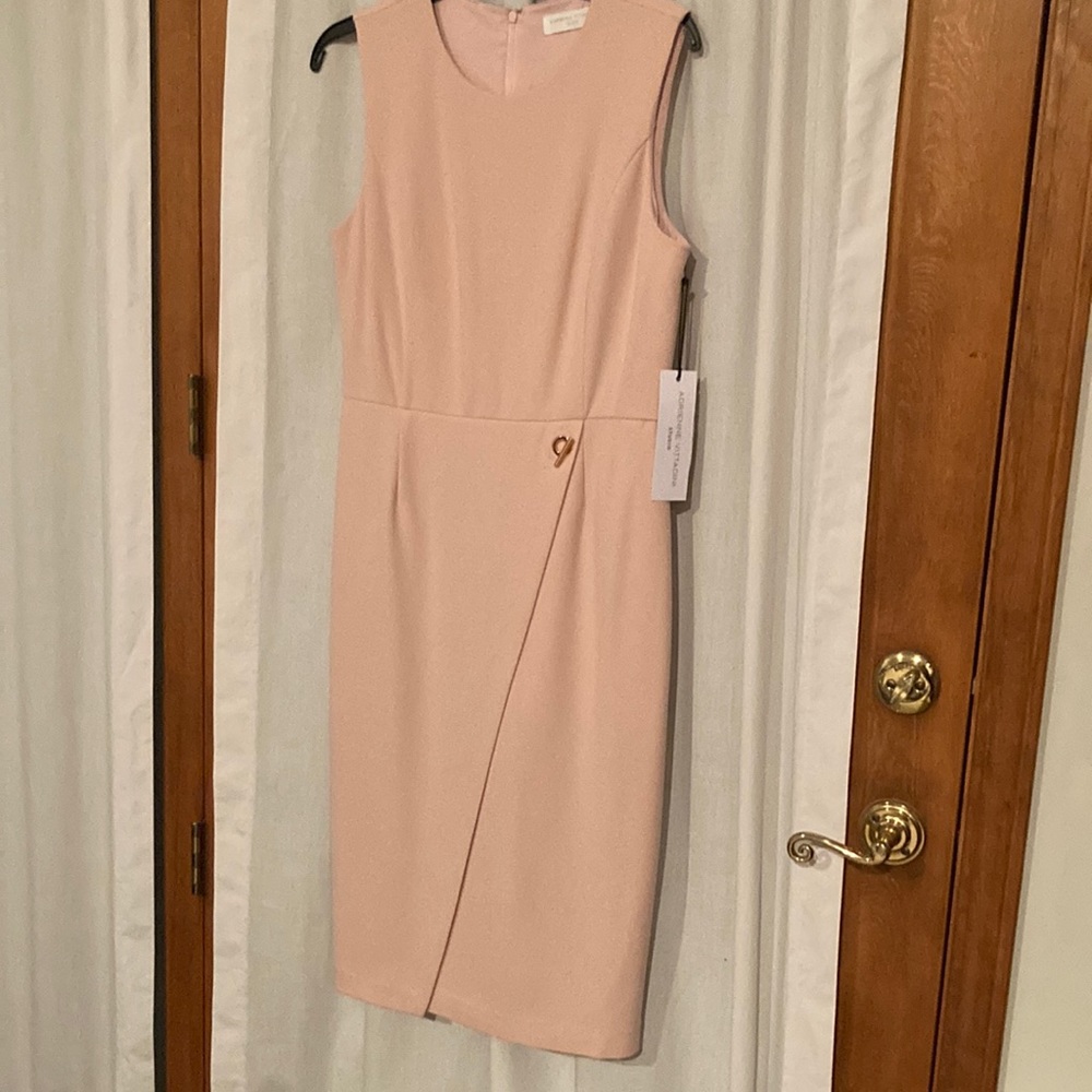 Size 10 light pink dress, never worn, with tags